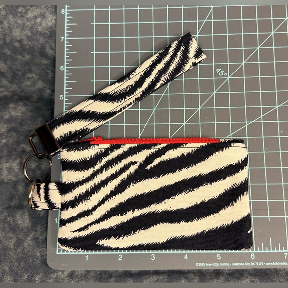 Zebra Print Wristlet with Red Zipper - Picture 2 of 4